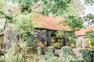 Wedding Barn Surrounded By Greenery | Essex Wedding Planner