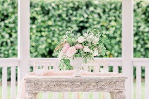 Ceremony Table with urn full of flowers