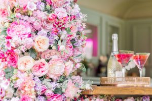 Faux flowers with cocktail glasses | Essex wedding planner