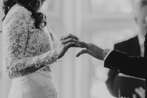 Bride & Groom exchanging rings | Luxury UK Wedding