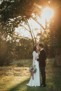Bride & Groom Kissing in Late Evening Sun | Luxury Essex Wedding