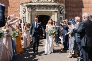 Bride & Groom with confetti | Luxury Essex wedding